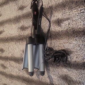 Large hair waver by Revlon. Used twice. I am uncoordinated and can't operate it.